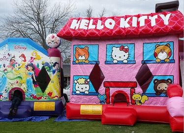 Le videur gonflable rose de Hello Kitty, explosion badine le château plein d'entrain pour l'amusement d'arrière-cour