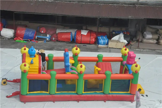 Château plein d'entrain gonflable sautant coloré de maison de rebond avec la glissière pour les enfants extérieurs