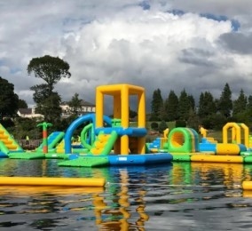 Parcs aquatiques gonflables flottants en plein air 0,9 mm PVC Jeux d'eau gonflables