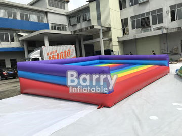 Jeux gonflables extérieurs drôles sautants gonflables de sport de videur gonflable de lit d'arc-en-ciel pour le terrain de jeu