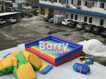 Jeux gonflables extérieurs drôles sautants gonflables de sport de videur gonflable de lit d'arc-en-ciel pour le terrain de jeu