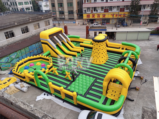 Parc d'attractions gonflable à l'eau sèche géante à l'extérieur National Indoor Big Bounce House With Wipe Out Game Slide
