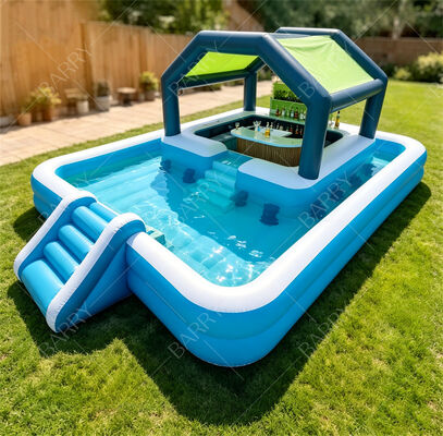 La station de fête aquatique ultime du jardin gonflable Bar de piscine flottante avec toboggan et auvent