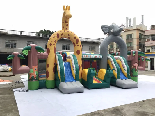 Château sautant de parc d'attractions gonflable de thème de jungle de terrain de jeu avec la glissière